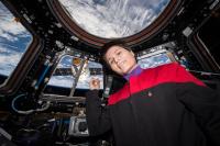 Italian ESA astronaut Samantha Cristoforetti in the Cupola on the International Space Station