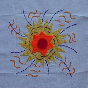 Fabric representation of the visible sun and its magnetic field.