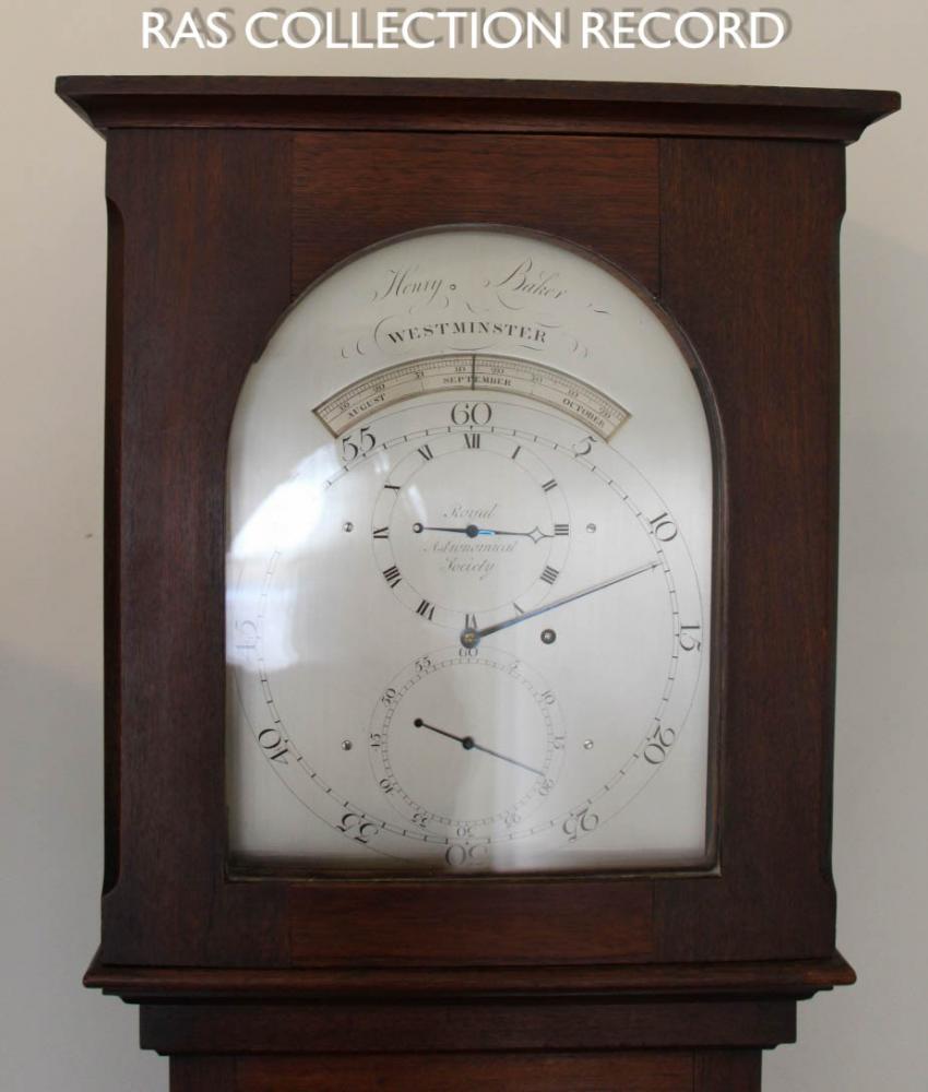 Regulator clock by Henry Baker close-up