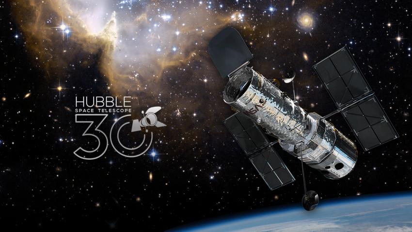 The Hubble Space Telescope in lower Earth orbit, a nebula in the background and the curvature of Earth.