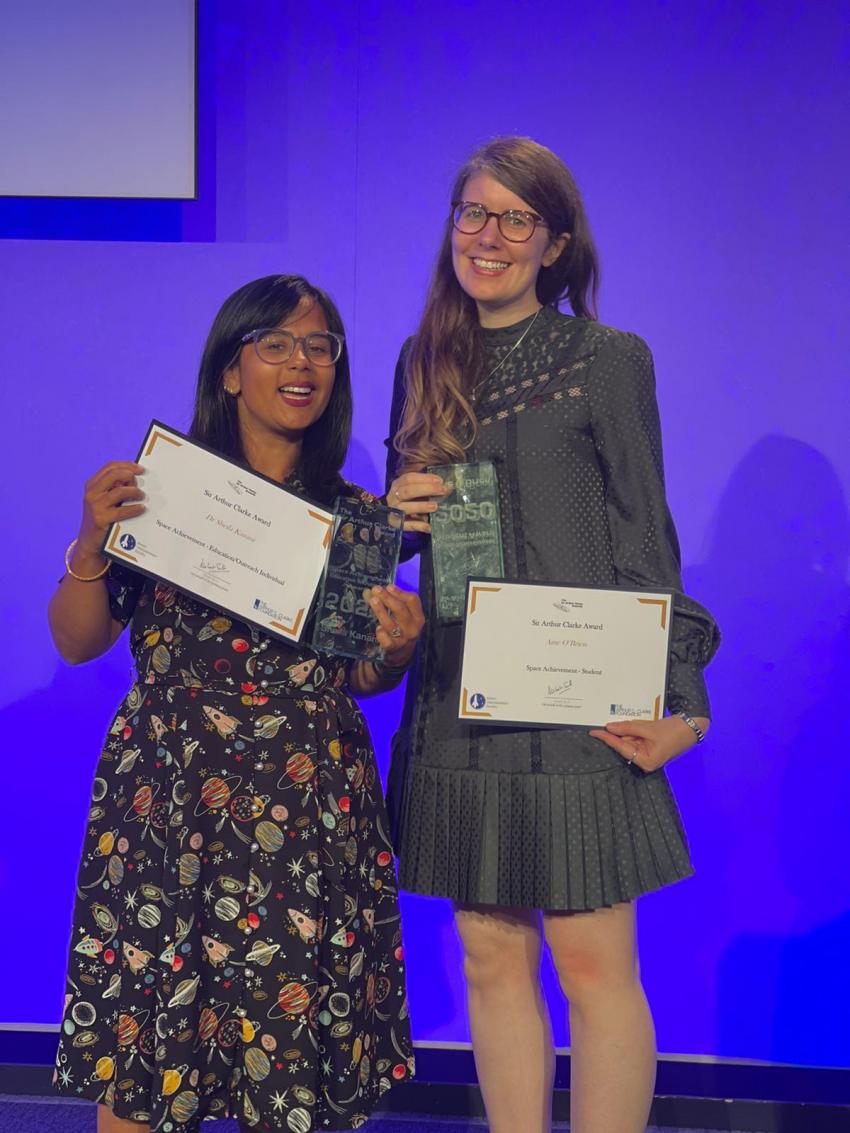 Image of Dr Sheila Kanani and Aine O'Brien at the BIS Reinventing Space Conference holding their awards.