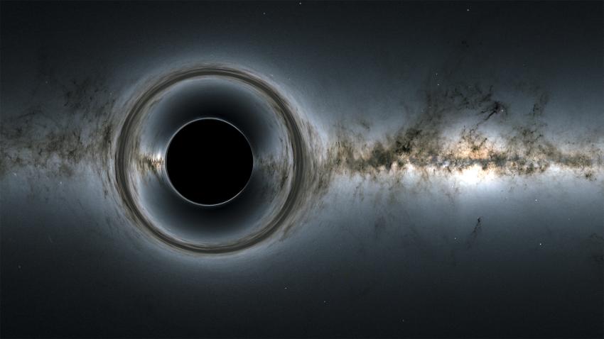 Image shows the Milky Way distorted by a large circular object that is a black hole.