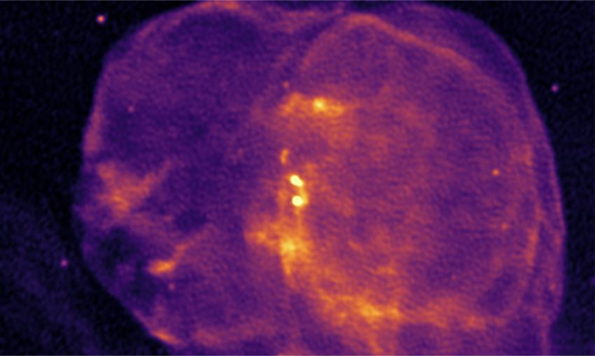 Radio image from the MeerKAT telescope showing Circinus X-1 in the centre, within the spherical remnant of the supernova it was born in.