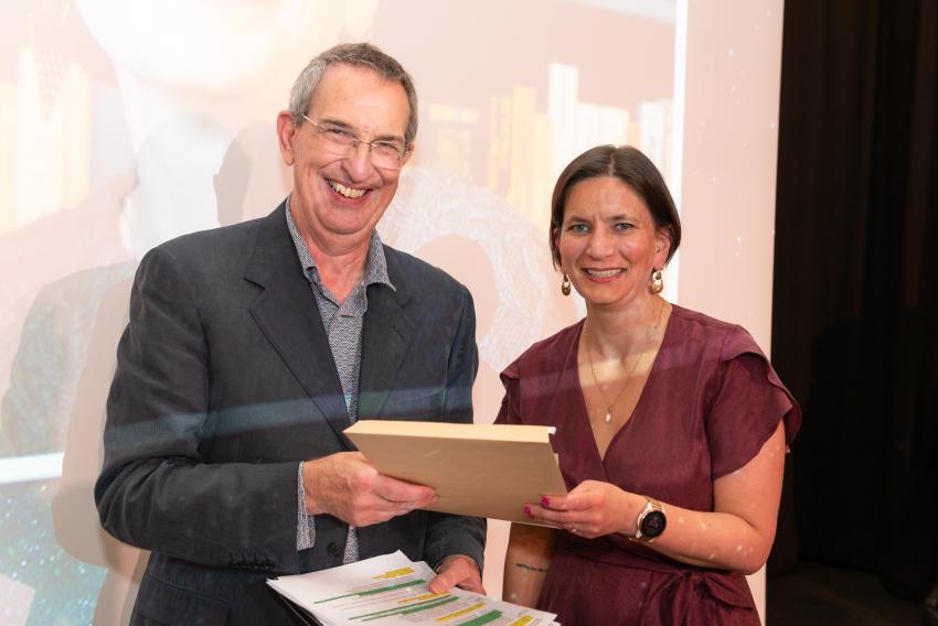 Dr Leah Morabito, of Durham University, is awarded the Fowler Award (A) by RAS President Mike Lockwood.