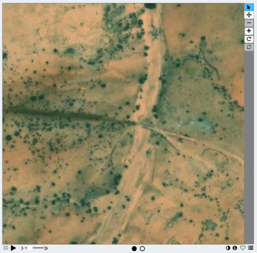 A satellite image showing a wadi crossing a road which can then be marked up using the markings from Zooniverse/Adler Planetarium, Chicago.