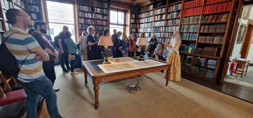 Caroline Herschel speaks to visitors during the Open House festival.