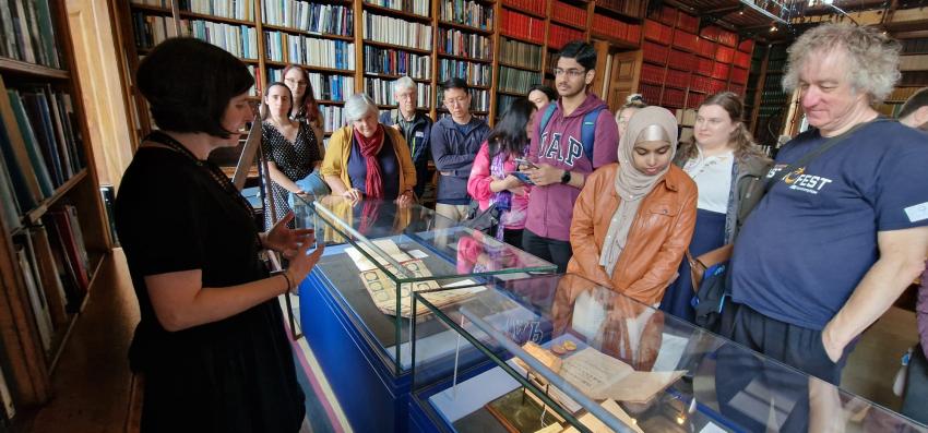 RAS archivist and librarian Sian Prosser shows members of the public the exhibits on display in the library.