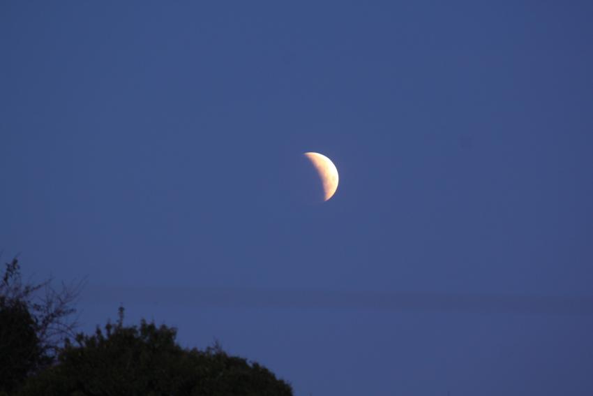 It appears as though the Moon has had a bite taken out of it in this image of the lunar eclipse above Lewes in East Sussex.