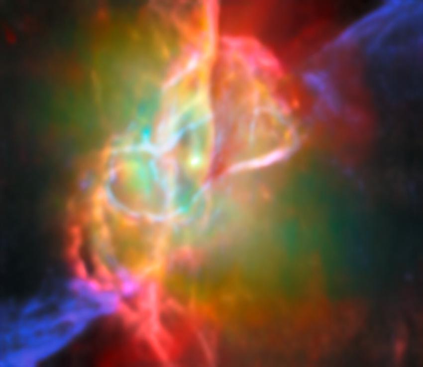 This image, which combines infrared data from the James Webb Space Telescope with submillimetre observations from the Atacama Large Millimetre/submillimetre Array (ALMA), shows the doughnut-shaped torus and interconnected bubbles of dusty gas that surround the Butterfly Nebula’s central star. The torus is oriented vertically and nearly edge-on from our perspective, and it intersects with bubbles of gas enclosing the star. The bubbles appear bright red in this image, illuminated by the light from helium and 