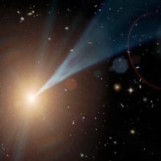 The artist's impression shows a source of bright yellow-white light against the dark backdrop of space. Coming from the centre of the light source is a conical jet that is blue in colour. Faint, smaller galaxies are seen in the background of the image,