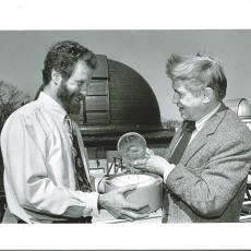  Philip Sadler & Owen Gingerich fill up a sundial with water on the roof of the Harvard University Observatory, April 25, 1995.