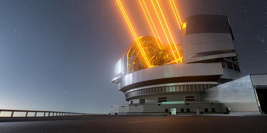 A very large ground-based telescope with observatory opened and using four laser guides.