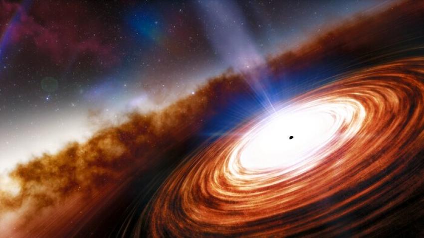 This artist's impression of a quasar shows a bright orange and white disc of material centred around a small black circle. A jet of light emanates from this circle, white and blue in colour.